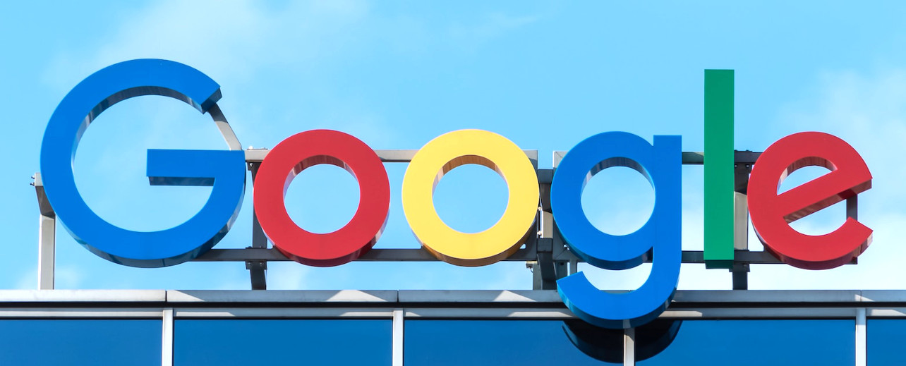 Intro picture showing a Google sign on an office building